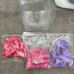 Assorted Pink and Purple Nail Polish remover  Clips